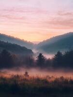 As the sun rises, pastel pinks and lavenders with shimmering gold light up misty mountains, green forests, and wildlife, creating a peaceful landscape that invites introspection and calm photo