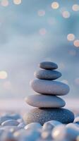 Tranquil stack of smooth stones amidst a serene blurred background photo
