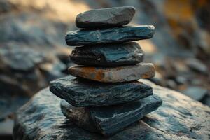 Stacked stones on a rocky surface at sunset in a natural landscape photo