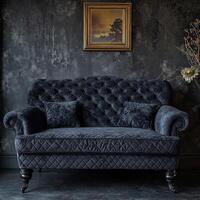 Elegant dark blue sofa with intricate upholstery and classic decor photo