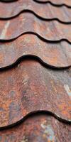 Rusty metal roofing with distinct patterns and texture in close view photo
