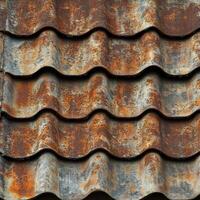 Weathered roof tiles displaying rust and deterioration over time photo