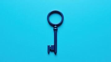 Blue key resting on a bright turquoise background creates a striking visual contrast and captures attention in a minimalist style photo