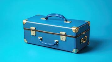Vintage blue suitcase with metal accents placed on vibrant blue background photo