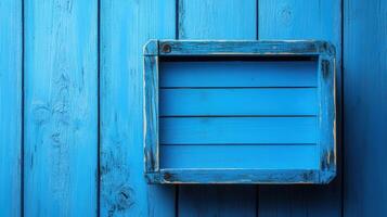 Unique blue wooden frame against a vibrant blue wooden wall, perfect for creative display ideas photo