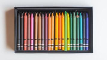 Vibrant box of coloring pencils arranged in order showcasing a spectrum of colors perfect for artistic creations photo