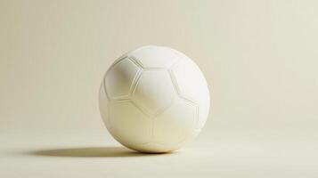 White soccer ball resting on a smooth surface with soft lighting photo
