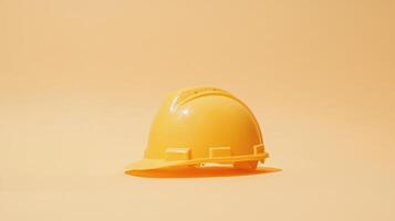 Yellow construction helmet placed on a flat surface with a warm background highlighting safety equipment photo