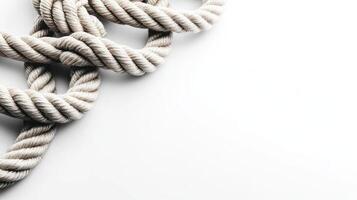 A complex arrangement of knotted rope highlights its texture and simplicity photo
