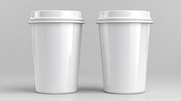 Two clean, empty white coffee cups are showcased on a smooth gray surface photo