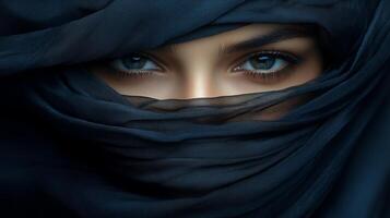 Eyes peer through layers of fabric, revealing a story of mystery and cultural beauty at twilight photo