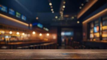 Empty wooden table in a dimly lit bar or pub. Perfect for showcasing your products photo