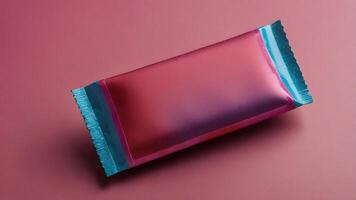 A vibrant, metallic candy bar wrapper mockup, showcasing a gradient design against a contrasting background. Ideal for packaging design inspiration. photo