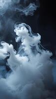 Abstract swirling smoke or vapor against a dark background. Creates a mysterious and ethereal mood. photo