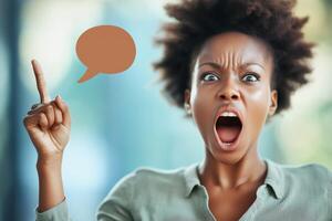 Surprised woman expressing excitement with an orange speech bubble and exclamation marks in a lively setting photo