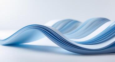 Blue and white piece of paper is folded into a wave photo