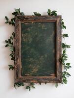 Dark green frame with leaves mockup photo