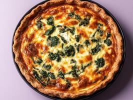 Delicious spinach and feta quiche in a rustic crust. photo