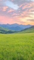 Serene Mountain Range at Sunset with Lush Green Fields and Dramatic Sky Enhancing Tranquility and Natural Beauty in Vertical Composition for Inspirational Nature Photography and Decoration photo