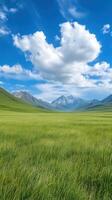 Majestic Mountain Landscape Under Blue Sky with Fluffy Clouds in a Serene Green Valley in Vibrant Daytime photo