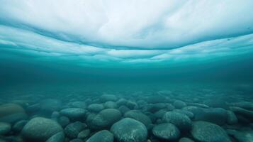 Underwater Iceberg Perspective Showcasing Stunning Above and Below View with Turquoise Waters and Rocks in Raw 169 Format photo