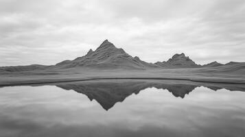 Perfect Reflection of Dramatic Badlands Ridges Under Overcast Sky in Tranquil Landscape with Mirror-Like Water and Majestic Mountainous Silhouettes, Showcasing Natural Beauty and Serene Calm photo
