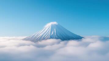 Majestic Snow-Covered Volcano Rising Above Clouds on a Clear Sunny Day in Vibrant Blue Sky AR 169 Style photo