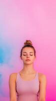 Peaceful Meditation of a Relaxed Woman Against Pink and Blue Gradient Background, Capturing Spiritual Energy and Calmness for Mindfulness Wellbeing and Inner Peace Concepts in Stock Photography photo
