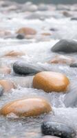 Serene River Flow Over Smooth Stones in a Calming Natural Setting with Gentle Water Movement and Peaceful Rocky Stream in Vertical Orientation, Perfect for Nature Relaxation and Meditation Themes photo