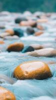 Vertical View of a Streaming River Over Stones in a Calm Natural Setting with Smooth Pebbles and Flowing Water Ideal for Tranquility, Relaxation, and Nature Scenes in Stock Photography photo