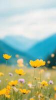Closeup View of Vibrant Yellow Wildflowers in Majestic Mountainous Landscape with Soft Focus and Blue Sky, Emphasizing Natural Beauty and Tranquility photo