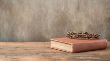 Bible and Crown of Thorns Symbolizing Faith and Sacrifice in Rustic Setting With Natural Light photo