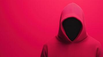Anonymous Figure in Red Hoodie Representing Cybersecurity and Cybercrime Concepts, Against a Vivid Red Background photo