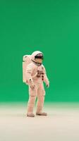 Astronaut Standing in Surreal Landscape with Green Screen Background Exploring Space Concepts and Earthly Illusions for Creative Design Projects in Futuristic Settings and Science Fiction Themes photo