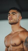 Strong Hispanic Bodybuilder Portrait Showcasing Muscular Physique In Dramatic Lighting Capturing Determination And Fitness Aspirations Ideal For Health And Fitness Themes With Inspirational Aspect photo