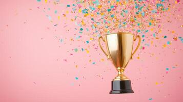 Golden trophy with colorful confetti explosion on a pink background Celebration and achievement concept representing victory and success photo