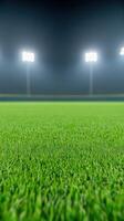 Baseball Field Stadium Illuminated at Night for Evening Game Tournament with Green Grass and Bright Stadium Lights in Background photo