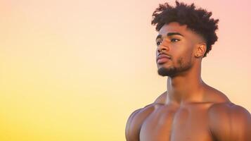 Fit Muscular Transgender Man Posing Against Vibrant Gradient Background Showing Strength and Confidence in Outdoor Setting During Sunset photo