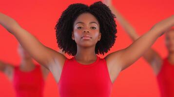 Confident Woman in Red Against Vibrant Background photo