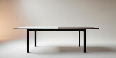 A white table with black legs and a black top photo