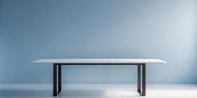A white table with a black frame sits in a room with a blue wallA white table with a black frame sits in a room with a blue wall. photo