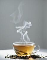 Freshly Brewed Tea with Steam Rising and Tea LeavesFreshly Brewed Tea with Steam Rising and Tea Leaves. photo