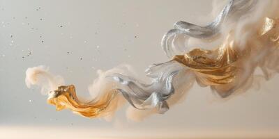 Elegant swirl of metallic gold and silver smoke with subtle sparkles in a dreamy composition photo