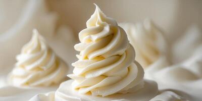 Swirls of creamy vanilla frosting on a light background photo