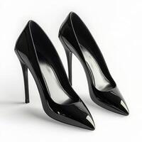 Elegant black high heels positioned neatly on a plain background showcasing their sleek design and glossy finish photo