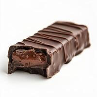 Chocolate bar with rich filling and decorative drizzle on a clean background photo