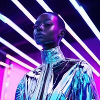 Modern fashion model poses in a reflective outfit under neon lights at an urban studio photo