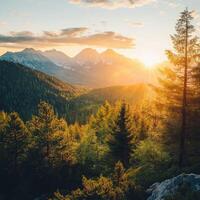 Mountain landscape with sunset illuminating the valley and trees in a peaceful natural setting photo