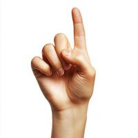 Hand gesture indicating one, signaling attention or agreement in a neutral setting photo