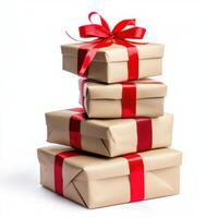 Gift boxes stacked elegantly with red ribbons for a festive occasion in a bright setting photo